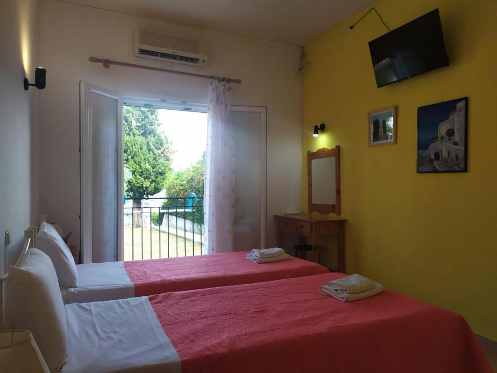 Eva apartments, Kassiopi, Imerolia, First Room with Smart TV in apartment 1 2