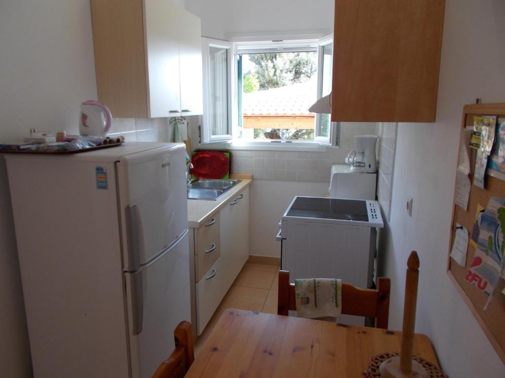 Eva apartments, Kassiopi, Imerolia, Kitchen in apartment 1 1