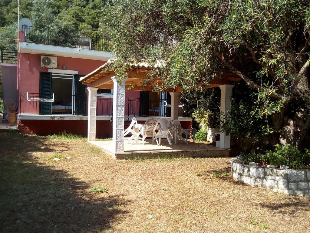 Eva apartments, Kassiopi, Imerolia, Garden with sea view in apartment 1 3