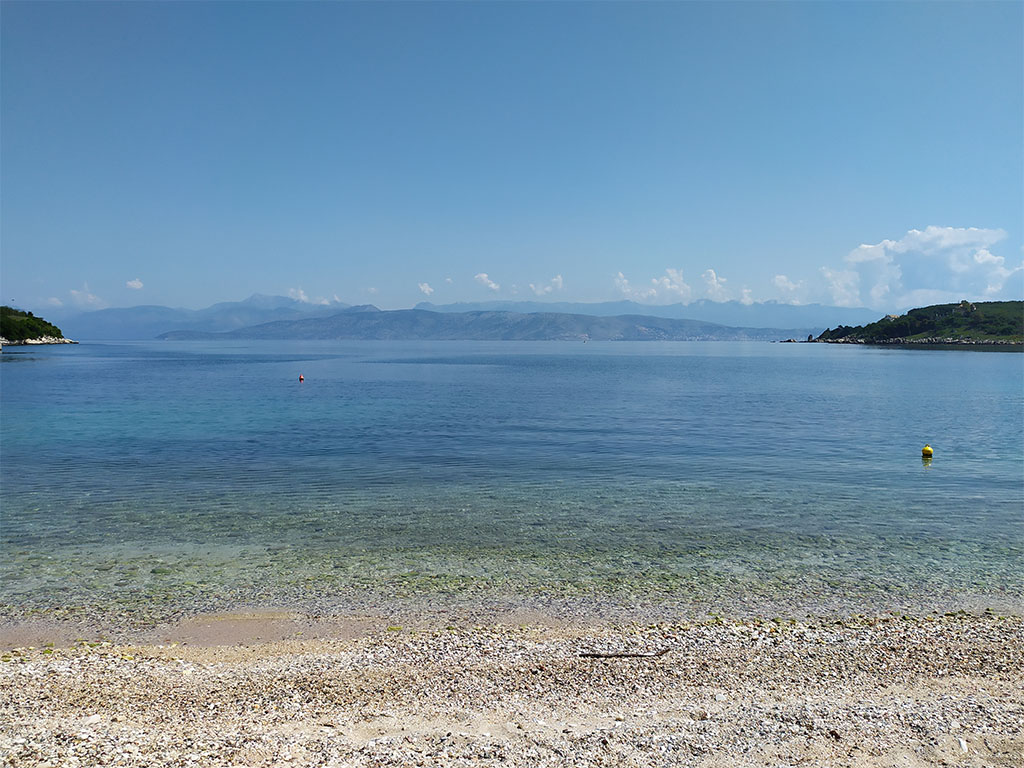 Eva apartments, Kassiopi, Imerolia, Imerolia Beach in front of the apartments yard 8